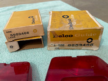 Load image into Gallery viewer, 1962-1964 Chevy II / Nova NOS Backup Tail Light Lamp Lens Pair Set #5953465 / 5953466