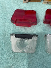 Load image into Gallery viewer, 1962-1964 Chevy II / Nova NOS Backup Tail Light Lamp Lens Pair Set #5953465 / 5953466