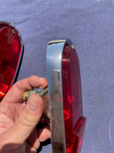 Load image into Gallery viewer, 1955-1959 Chevrolet Suburban Panel Truck USED Tail Light Lamp Lens + Bezel Pair #5952787 / 5946391