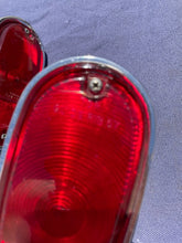 Load image into Gallery viewer, 1955-1959 Chevrolet Suburban Panel Truck USED Tail Light Lamp Lens + Bezel Pair #5952787 / 5946391