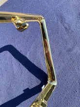 Load image into Gallery viewer, 1958 Chevrolet Bel Air Biscayne Delray NORS Accessory GOLD Bowtie License Plate Frame
