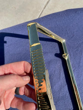 Load image into Gallery viewer, 1958 Chevrolet Bel Air Biscayne Delray NORS Accessory GOLD Bowtie License Plate Frame