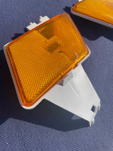 Load image into Gallery viewer, 1970 Chevrolet Bel Air, Biscayne, Caprice, Impala NOS Front Bumper/Fender Amber Side Marker Pair #917091 / 917092 / 917653 / 917654