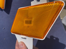 Load image into Gallery viewer, 1970 Chevrolet Bel Air, Biscayne, Caprice, Impala NOS Front Bumper/Fender Amber Side Marker Pair #917091 / 917092 / 917653 / 917654
