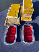Load image into Gallery viewer, 1960-1966 Chevrolet Fleetside Pickup Truck NOS Tail Light Lamp Lens + Bezel Pair #5952677 / 3763570