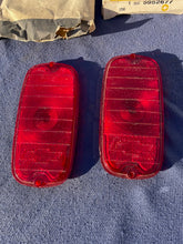Load image into Gallery viewer, 1960-1966 Chevrolet Fleetside Pickup Truck NOS Tail Light Lamp Lens + Bezel Pair #5952677 / 3763570
