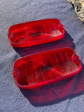 Load image into Gallery viewer, 1960-1966 Chevrolet Fleetside Pickup Truck NOS Tail Light Lamp Lens + Bezel Pair #5952677 / 3763570