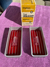 Load image into Gallery viewer, 1970 Chevrolet IMPALA NOS  Tail Light (w/ Backup) Lamp Lens Pair #5964229 / 5964230