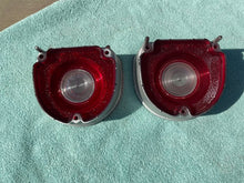Load image into Gallery viewer, 1968 Chevrolet Bel-Air Impala NOS Tail Light (w/ Backup) Lamp Lens Pair (CHIPPED TAB) #5959866