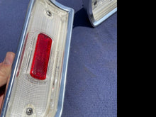 Load image into Gallery viewer, 1964 Chevrolet Chevelle Malibu 300 NOS GUIDE Backup Light Lamp Lens Pair #910531 / 910532