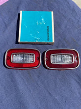 Load image into Gallery viewer, 1971 -  1973 Chevrolet Vega Coupe NOS GUIDE Backup Light Lamp Lens Pair #5966018