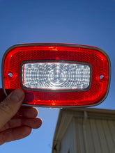 Load image into Gallery viewer, 1971 -  1973 Chevrolet Vega Coupe NOS GUIDE Backup Light Lamp Lens Pair #5966018