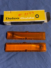 Load image into Gallery viewer, 1963-1964 Chevy II / Nova NOS AMBER Park Light Lamp Turn Signal Indicator Lens Pair #5954493 / 5954494