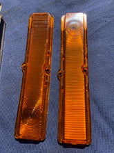 Load image into Gallery viewer, 1963-1964 Chevy II / Nova NOS AMBER Park Light Lamp Turn Signal Indicator Lens Pair #5954493 / 5954494