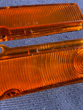 Load image into Gallery viewer, 1963-1964 Chevy II / Nova NOS AMBER Park Light Lamp Turn Signal Indicator Lens Pair #5954493 / 5954494