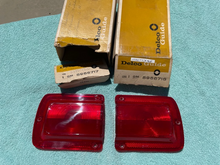 Load image into Gallery viewer, 1965 Chevrolet Chevelle 300 Deluxe 6 V8 396 327 NOS Tail Light Lamp Lens Pair #5956717 / 5956718