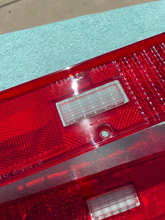 Load image into Gallery viewer, 1970 1971 Chevrolet Nova SS NOS Tail Light Lamp Lens Pair #5964171 / 5964172