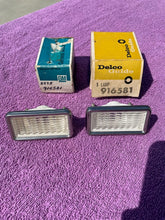Load image into Gallery viewer, 1968 Chevrolet Corvette, Camaro, Corvair, Impala NOS Front Clear Side Marker Lens Bezels #916581