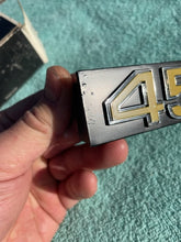 Load image into Gallery viewer, 1975 1976 Chevrolet Pickup Truck C10 C20 C30 NOS "454" Grille Emblem #357286 (cast 343992)
