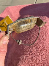 Load image into Gallery viewer, 1966-1971 Chevrolet NOS Delco GUIDE License Plate Lamp Lens Assembly #910967