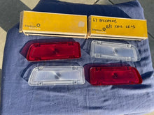 Load image into Gallery viewer, 1967 Chevrolet Biscayne Sedan NOS Delco GUIDE Backup / Tail Light Lamp Lens Set