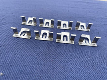 Load image into Gallery viewer, 1950 1951 1952 Chevy Bel Air Hardtop NEW Stainless Steel Rear Window Lower Reveal Molding Clip Set (OEM #4571696)