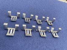 Load image into Gallery viewer, 1950 1951 1952 Chevy Bel Air Hardtop NEW Stainless Steel Rear Window Lower Reveal Molding Clip Set (OEM #4571696)