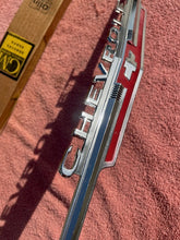 Load image into Gallery viewer, 1962 Chevrolet Chevy II 2 Nova 4 6 300 Standard NOS Hood Lip Emblem #3792812
