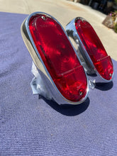 Load image into Gallery viewer, 1955-1959 Chevrolet Suburban Panel Truck USED Tail Light Lamp Lens + Bezel Pair #5952787 / 5946391
