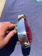 Load image into Gallery viewer, 1955-1959 Chevrolet Suburban Panel Truck USED Tail Light Lamp Lens + Bezel Pair #5952787 / 5946391
