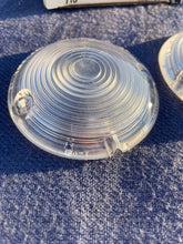 Load image into Gallery viewer, 1957 Chevrolet 150 210 Bel Air NORS CLEAR Park Light Lamp Turn Signal Lens Pair (OEM #5947754)

