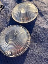 Load image into Gallery viewer, 1957 Chevrolet 150 210 Bel Air NORS CLEAR Park Light Lamp Turn Signal Lens Pair (OEM #5947754)
