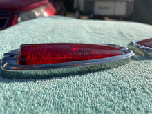 Load image into Gallery viewer, 1941 - 1948 Chevrolet Fleetline 4-door sedan NOS Guide Tail Light Lamp Lenses / Bezels #5930829/5930830

