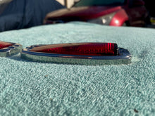 Load image into Gallery viewer, 1941 - 1948 Chevrolet Fleetline 4-door sedan NOS Guide Tail Light Lamp Lenses / Bezels #5930829/5930830
