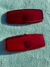 Load image into Gallery viewer, 1941 - 1948 Chevrolet Fleetline 4-door sedan NOS Guide Tail Light Lamp Lenses / Bezels #5930829/5930830
