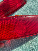 Load image into Gallery viewer, 1941 - 1948 Chevrolet Fleetline 4-door sedan NOS Guide Tail Light Lamp Lenses / Bezels #5930829/5930830
