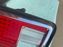Load image into Gallery viewer, 1974 - 1977 Chevrolet Camaro NOS LH Tail Light Lens #5954285 / 5954137
