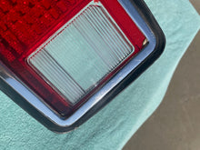 Load image into Gallery viewer, 1974 - 1977 Chevrolet Camaro NOS LH Tail Light Lens #5954285 / 5954137
