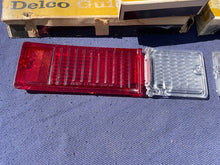 Load image into Gallery viewer, 1968 1969 Chevy II / Nova NOS Backup Tail Light Lamp Lens Pair Set #5960133/5960134/5960135/5960136
