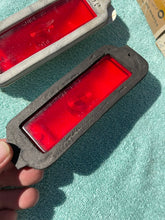 Load image into Gallery viewer, 1968 Chevrolet Biscayne Caprice Impala NOS RED Rear Side Marker Lenses + Bezels (3921403 / 3921404 / 916754)
