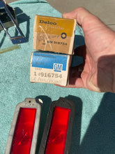 Load image into Gallery viewer, 1968 Chevrolet Biscayne Caprice Impala NOS RED Rear Side Marker Lenses + Bezels (3921403 / 3921404 / 916754)
