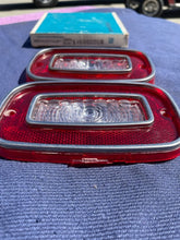 Load image into Gallery viewer, 1971 -  1973 Chevrolet Vega Coupe NOS GUIDE Backup Light Lamp Lens Pair #5966018
