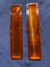 Load image into Gallery viewer, 1963-1964 Chevy II / Nova NOS AMBER Park Light Lamp Turn Signal Indicator Lens Pair #5954493 / 5954494
