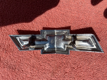 Load image into Gallery viewer, 1974 Chevrolet Impala &amp; Bel Air NOS Bowtie Grille Emblem #6260819
