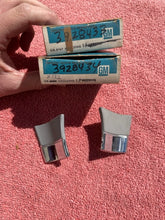 Load image into Gallery viewer, 1968 Chevrolet Bel Air Biscayne Impala Caprice NOS Headlight to Front Fender Trim Molding Filler Pair #3928433 / 3928434
