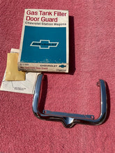 Load image into Gallery viewer, 1965 1966 Chevrolet Station Wagon NOS Accessory Trim Gas Door Guard #986241
