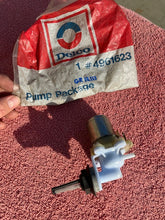 Load image into Gallery viewer, 1976 - 1981 Chevrolet Vega + Monza NOS Windshield Washer Pump + Filter #4961623
