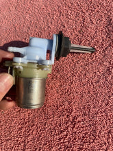 Load image into Gallery viewer, 1976 - 1981 Chevrolet Vega + Monza NOS Windshield Washer Pump + Filter #4961623
