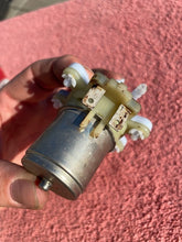 Load image into Gallery viewer, 1976 - 1981 Chevrolet Vega + Monza NOS Windshield Washer Pump + Filter #4961623
