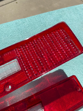 Load image into Gallery viewer, 1970 1971 Chevrolet Nova SS NOS Tail Light Lamp Lens Pair #5964171 / 5964172
